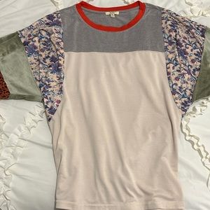 Fun shirt for spring with different fabrics and textures. Very comfy and so cute